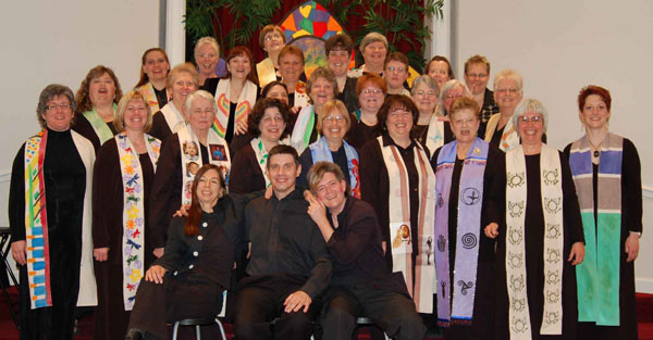 laughing chorus in stoles we decorated to reflect our spirituality